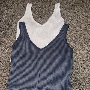 2 cropped tight tanks